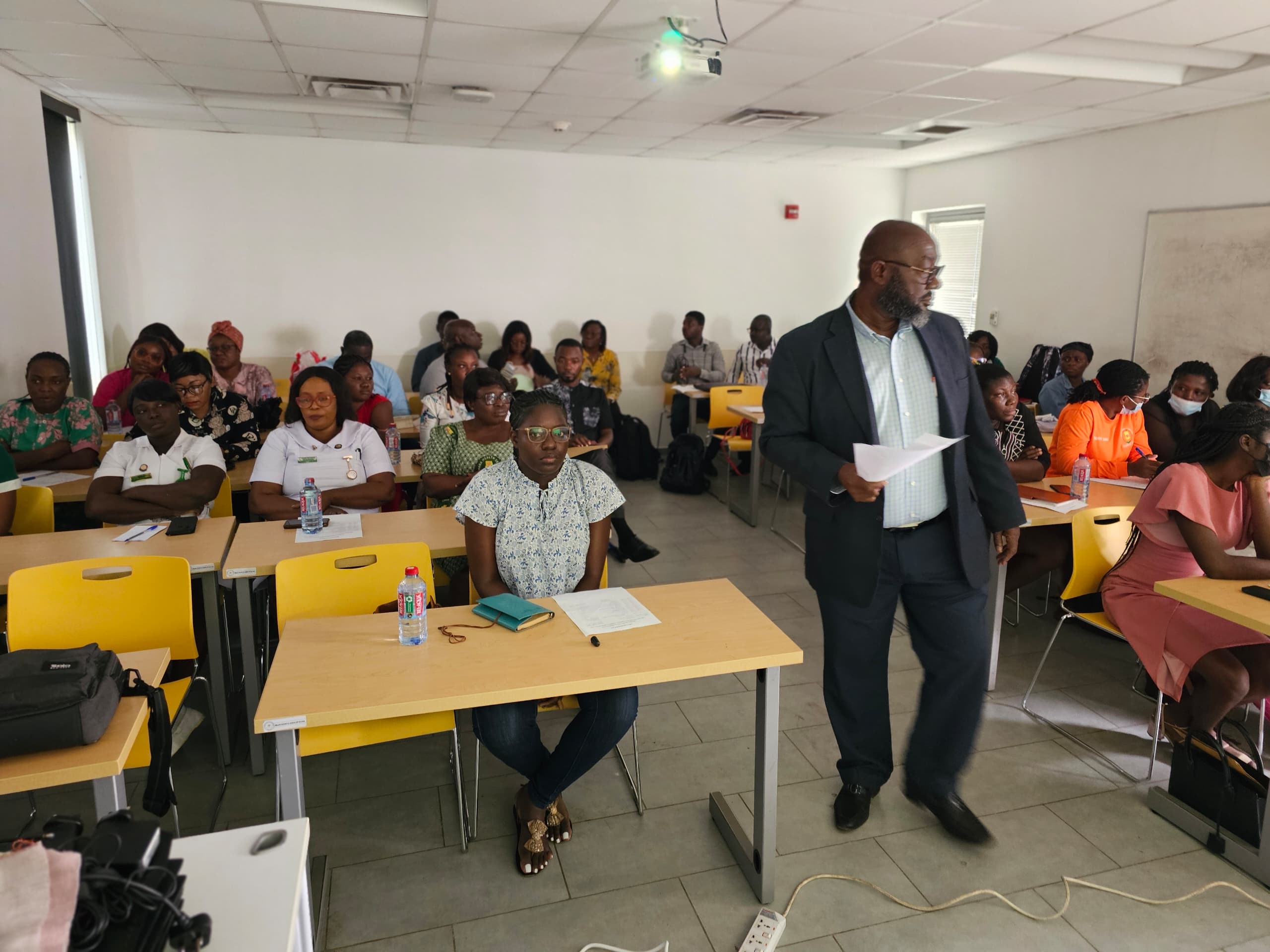 Health workers collaborating during LHIMS training